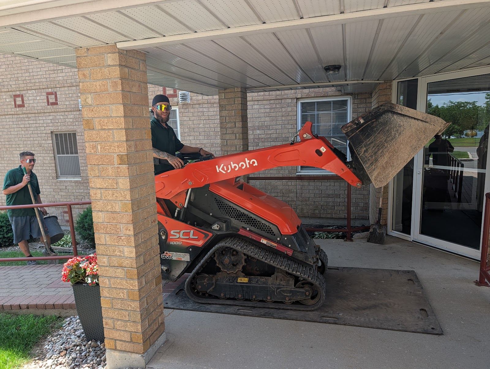 Compact track loader used by SD&G Contracting for lawn care in Cornwall, Ontario