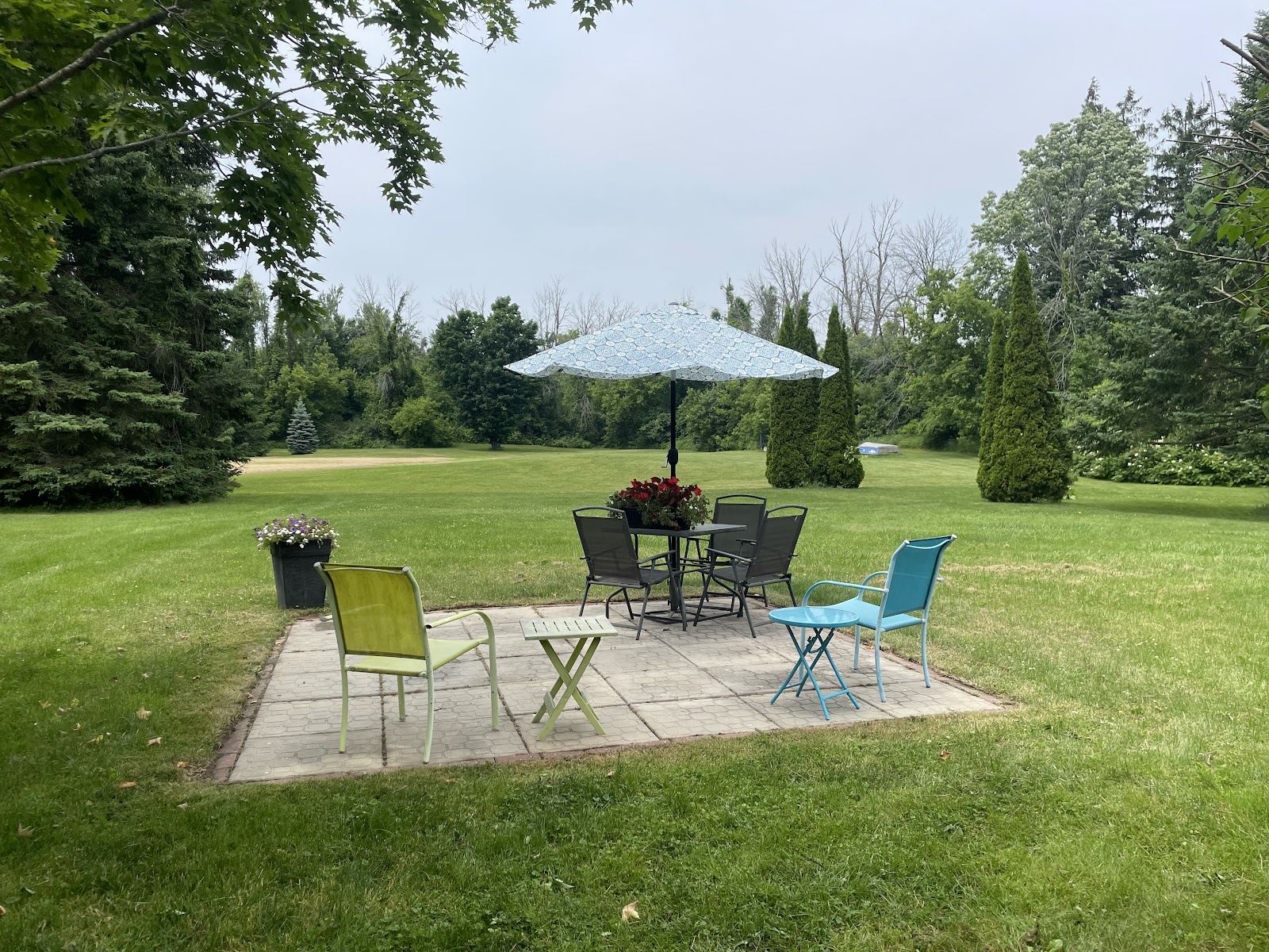 Mowed backyard lawn with patio in Cornwall, Ontario