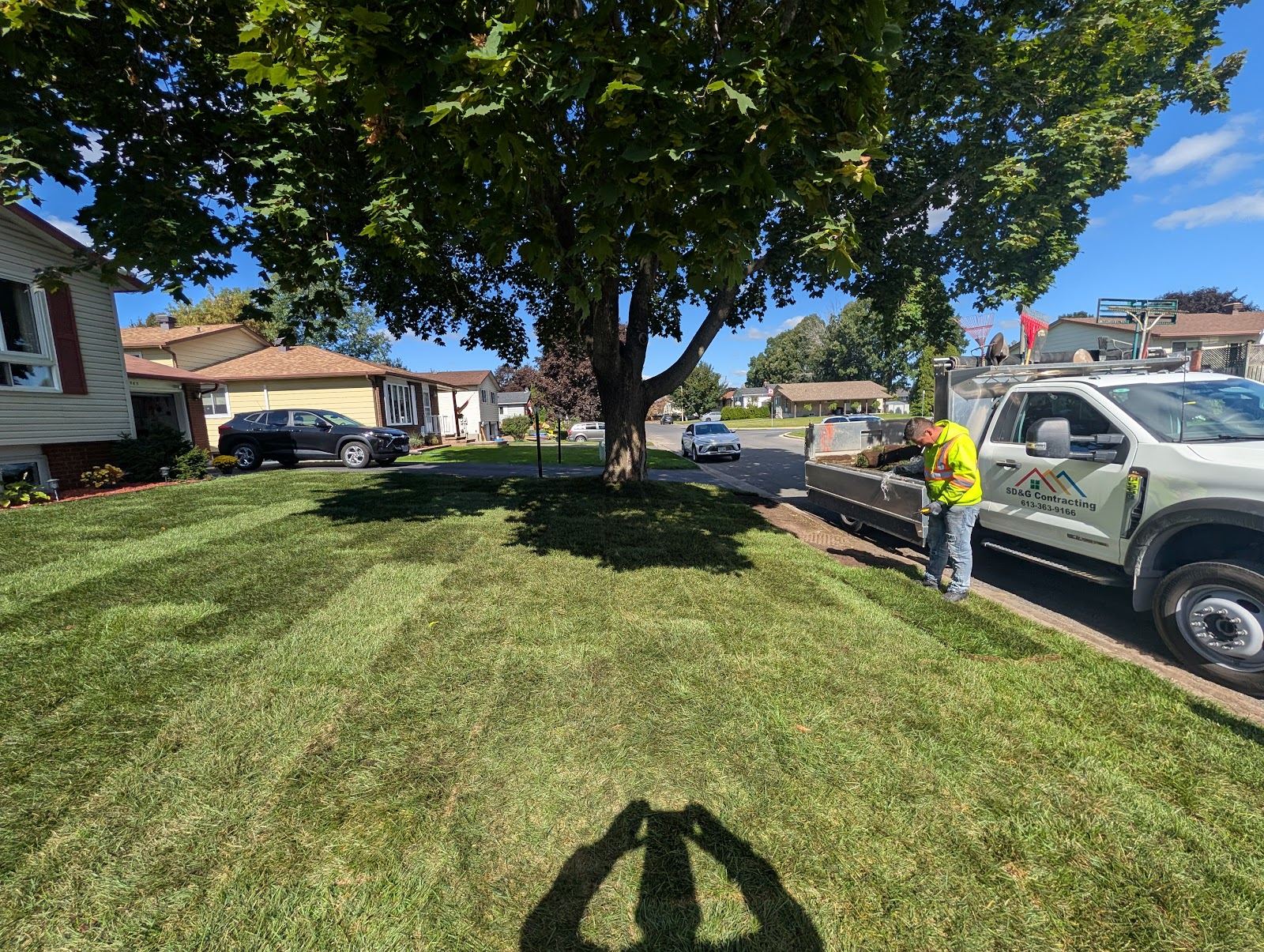 Newly installed lawn with SD&G Contracting truck in Cornwall, Ontario